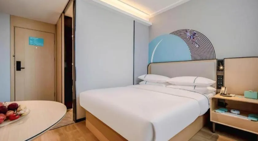 Bed in City Comfort Inn Nanning Guangxi University