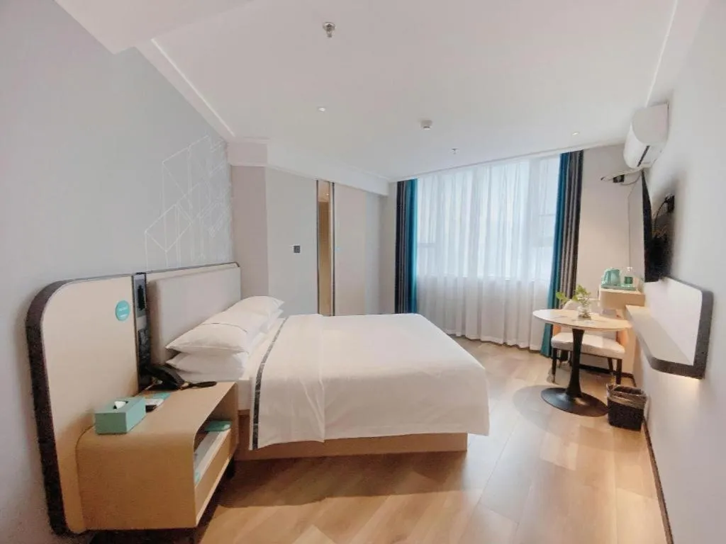 Bed in City Comfort Inn Nanning Guangxi University