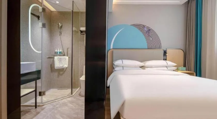 Bed in City Comfort Inn Nanning Guangxi University