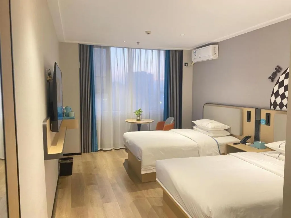 Bed in City Comfort Inn Nanning Guangxi University