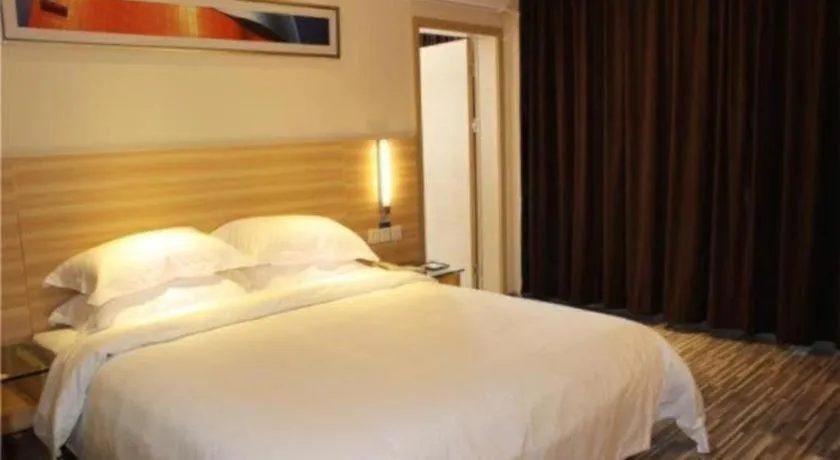 Bed in City Comfort Inn Zhongshan Shaxi Starbao Rosewood Expo City