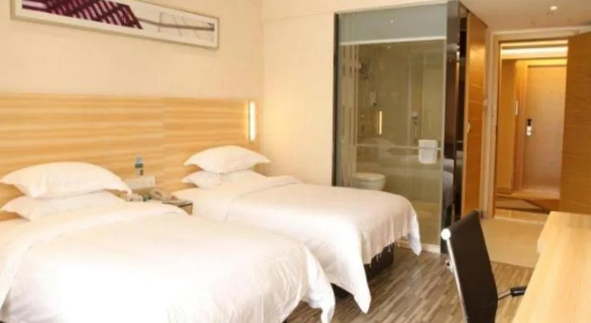 Bed in City Comfort Inn Zhongshan Shaxi Starbao Rosewood Expo City