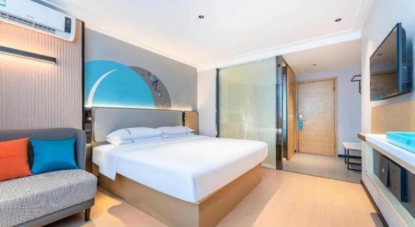 Bed in City Comfort Inn Zhongshan Shaxi Starbao Rosewood Expo City