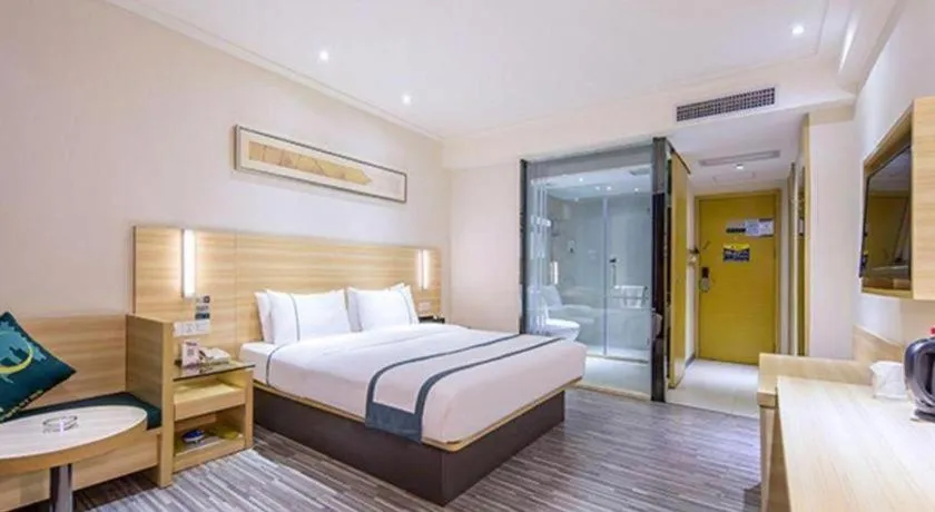 Bed in City Comfort Inn Zhongshan Shaxi Starbao Rosewood Expo City