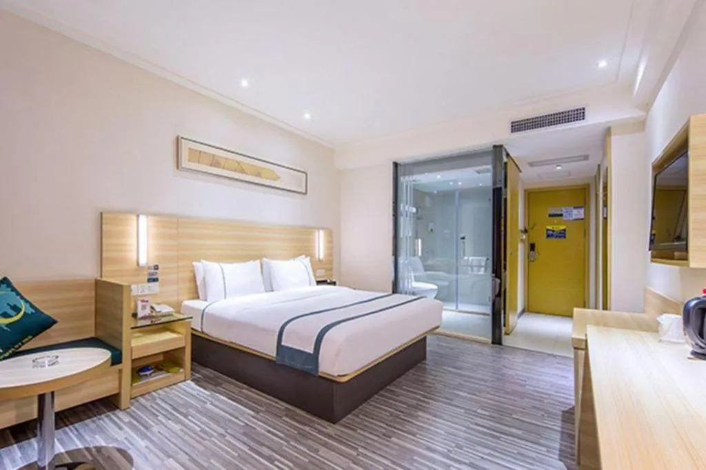 Bed in City Comfort Inn Zhongshan Shaxi Starbao Rosewood Expo City