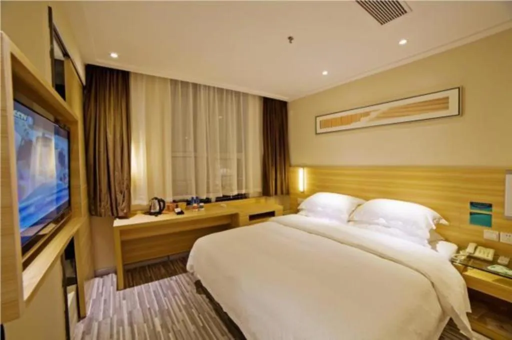 Bed in City Comfort Inn Zhongshan Shaxi Starbao Rosewood Expo City