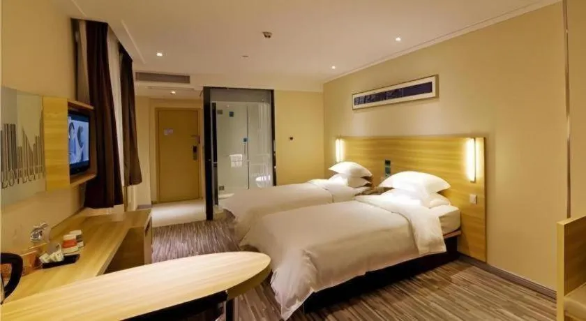 Bed in City Comfort Inn Zhongshan Shaxi Starbao Rosewood Expo City