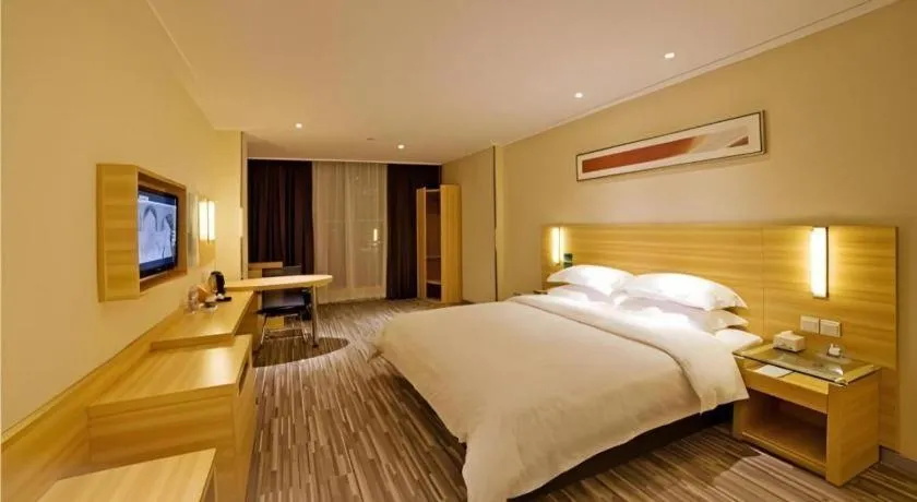 Bed in City Comfort Inn Zhongshan Shaxi Starbao Rosewood Expo City