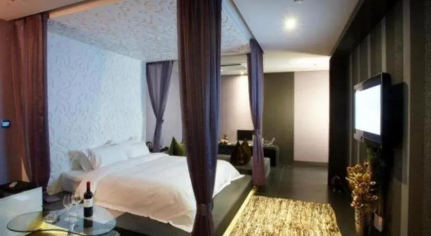 Bed in Qingdao Hengbo Hotel