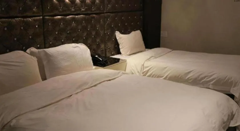 Bed in Qingdao Hengbo Hotel