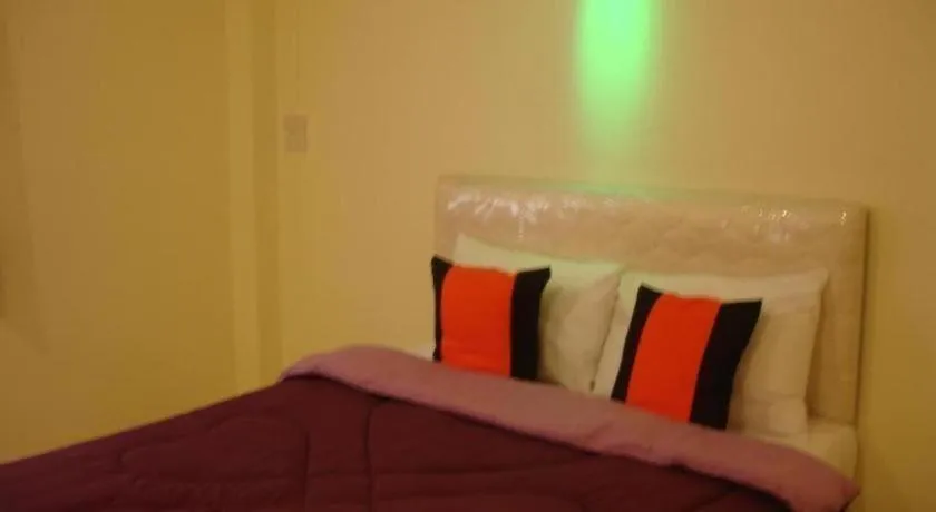 Bed in Green Home Resort