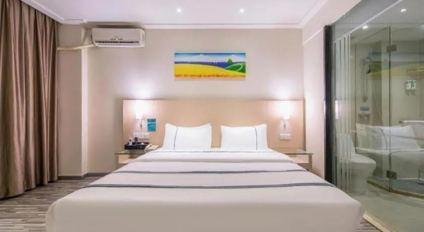 Bed in City Comfort Inn Wuzhou Wangcheng Square