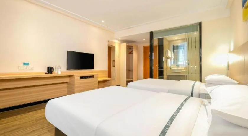Bed in City Comfort Inn Wuzhou Wangcheng Square