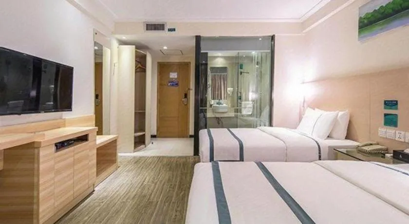 Bed in City Comfort Inn Wuzhou Wangcheng Square