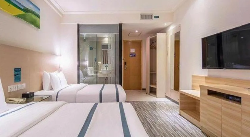 Bed in City Comfort Inn Wuzhou Wangcheng Square