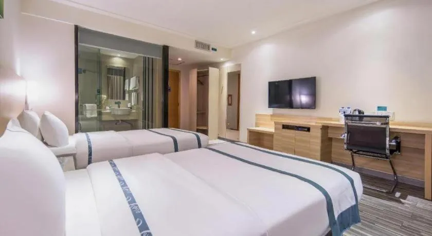 Bed in City Comfort Inn Wuzhou Wangcheng Square