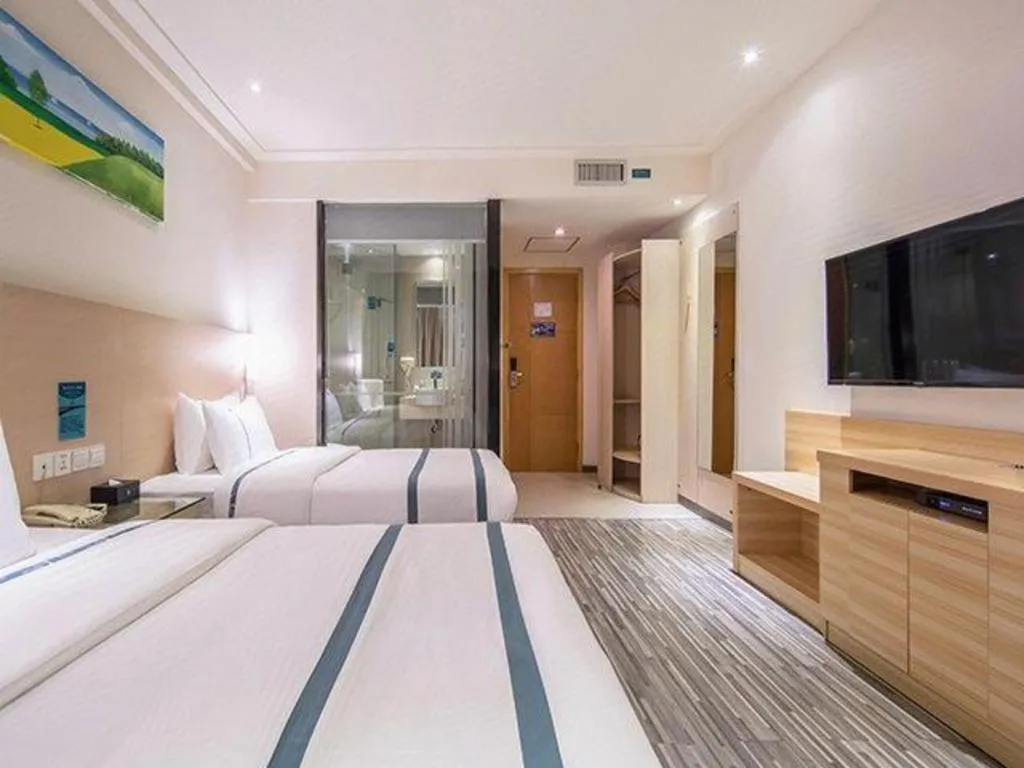 Bed in City Comfort Inn Wuzhou Wangcheng Square