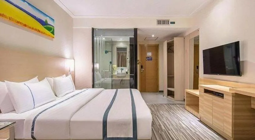 Bed in City Comfort Inn Wuzhou Wangcheng Square