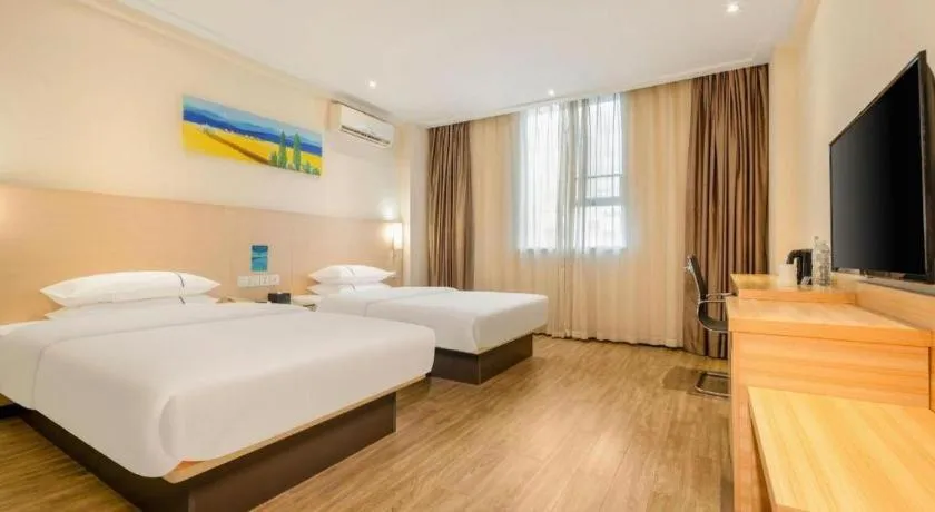Bed in City Comfort Inn Wuzhou Wangcheng Square
