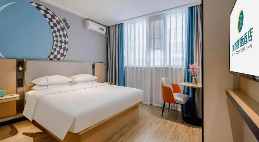 Bed in City Comfort Inn Wuzhou Wangcheng Square