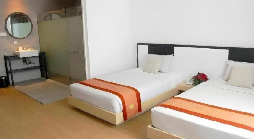 Bed in Buana Lestari Hotel