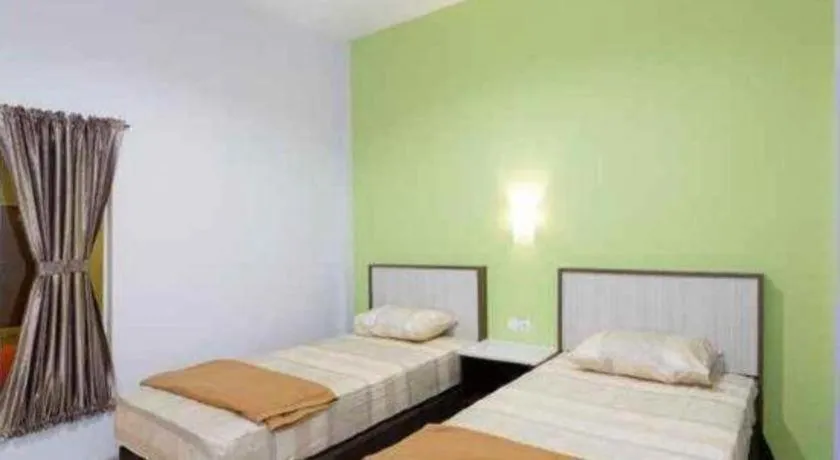 Bed in Zaen Hotel Syariah Solo