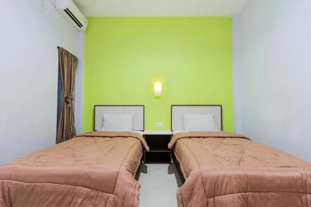 Bed in Zaen Hotel Syariah Solo