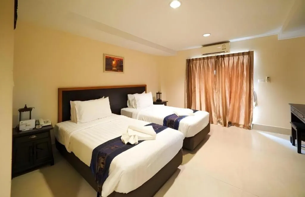Bed in Rayong Lanna Hotel