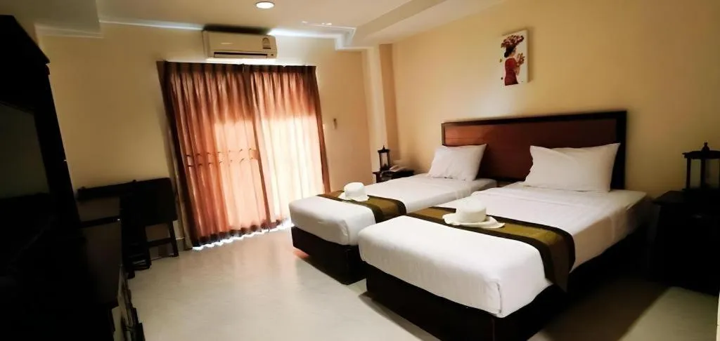 Bed in Rayong Lanna Hotel