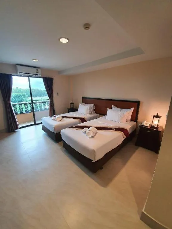 Bed in Rayong Lanna Hotel