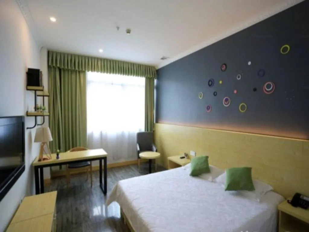 Bed in Yi Mi Hotel Shenzhen Longgang Pinghu South China City