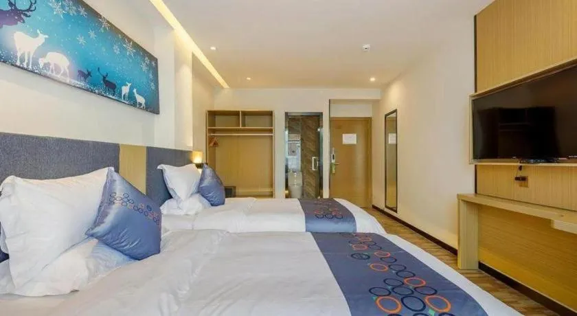 Bed in Yi Mi Hotel Shenzhen Longgang Pinghu South China City