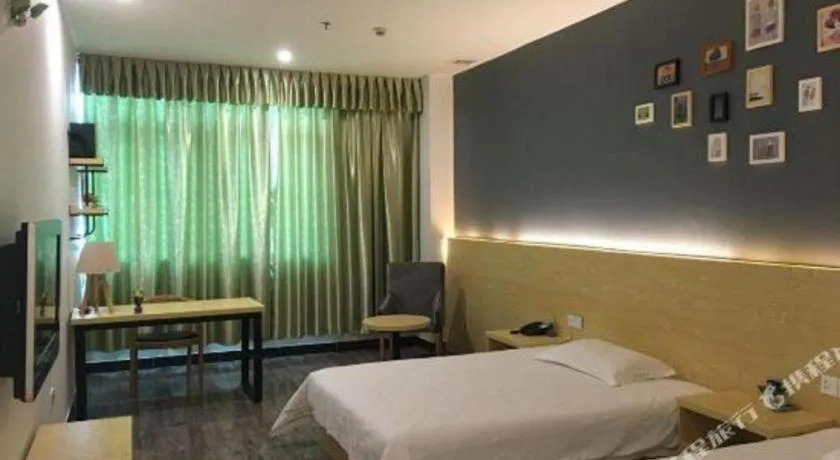 Bed in Yi Mi Hotel Shenzhen Longgang Pinghu South China City
