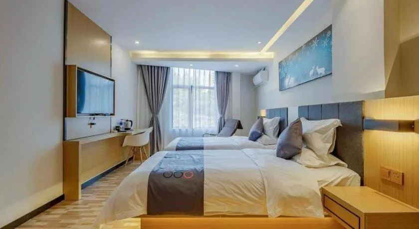 Bed in Yi Mi Hotel Shenzhen Longgang Pinghu South China City