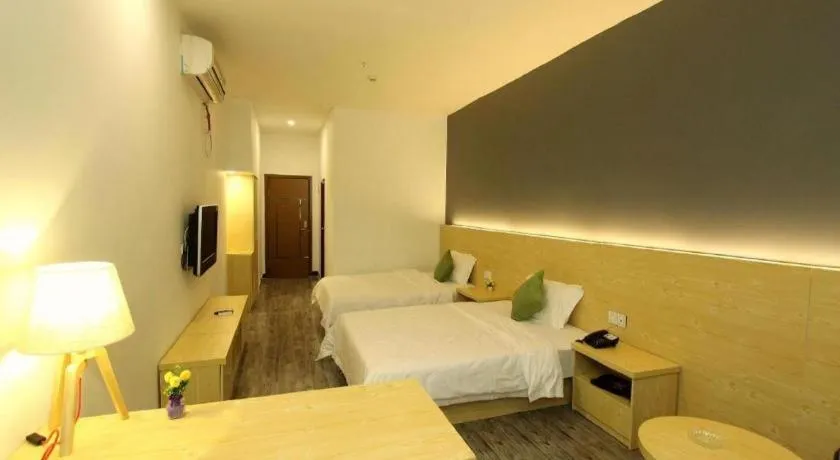 Bed in Yi Mi Hotel Shenzhen Longgang Pinghu South China City