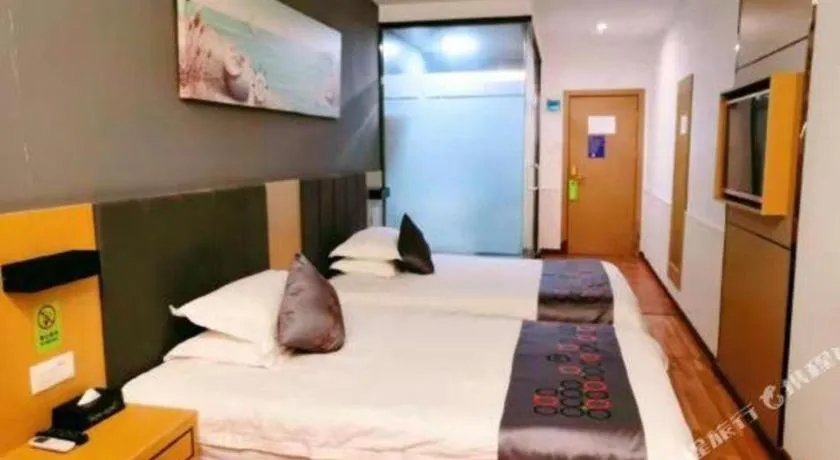 Bed in Yi Mi Hotel Shenzhen Longgang Pinghu South China City