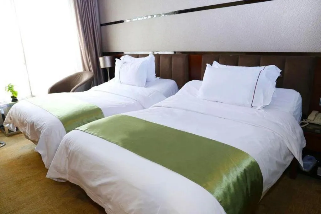 Bed in Liwan International Hotel Chengdu