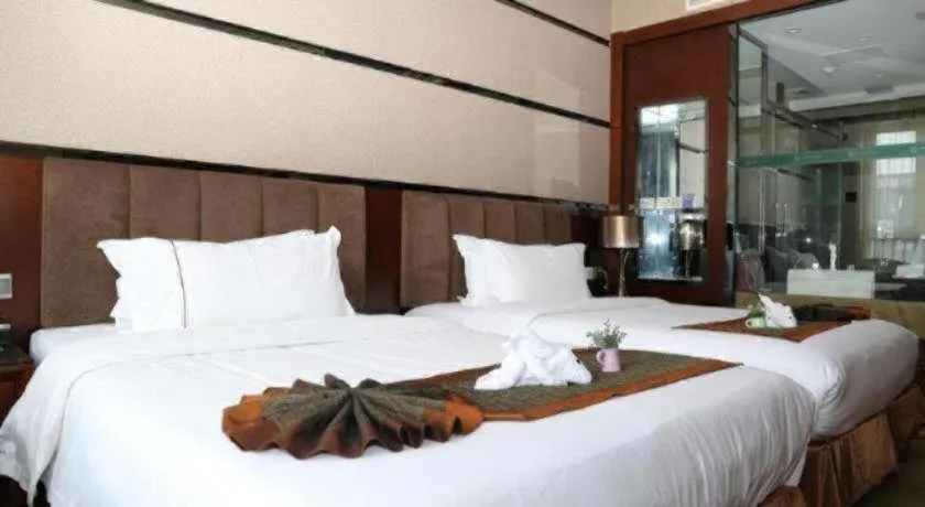 Bed in Liwan International Hotel Chengdu