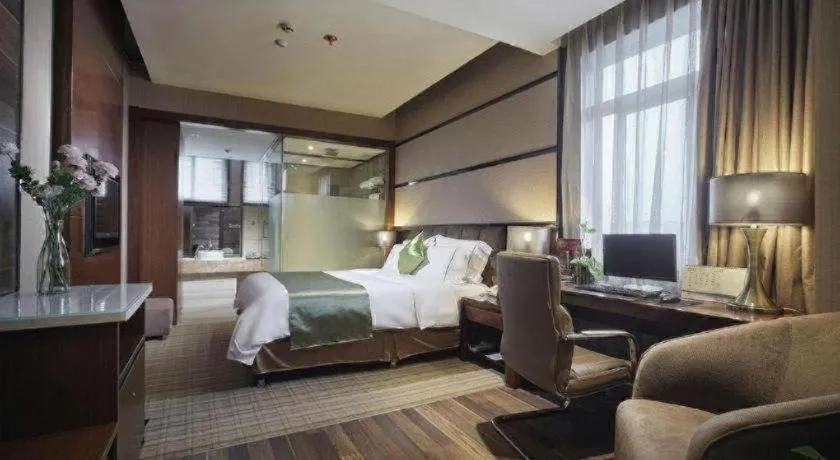 Bed in Liwan International Hotel Chengdu