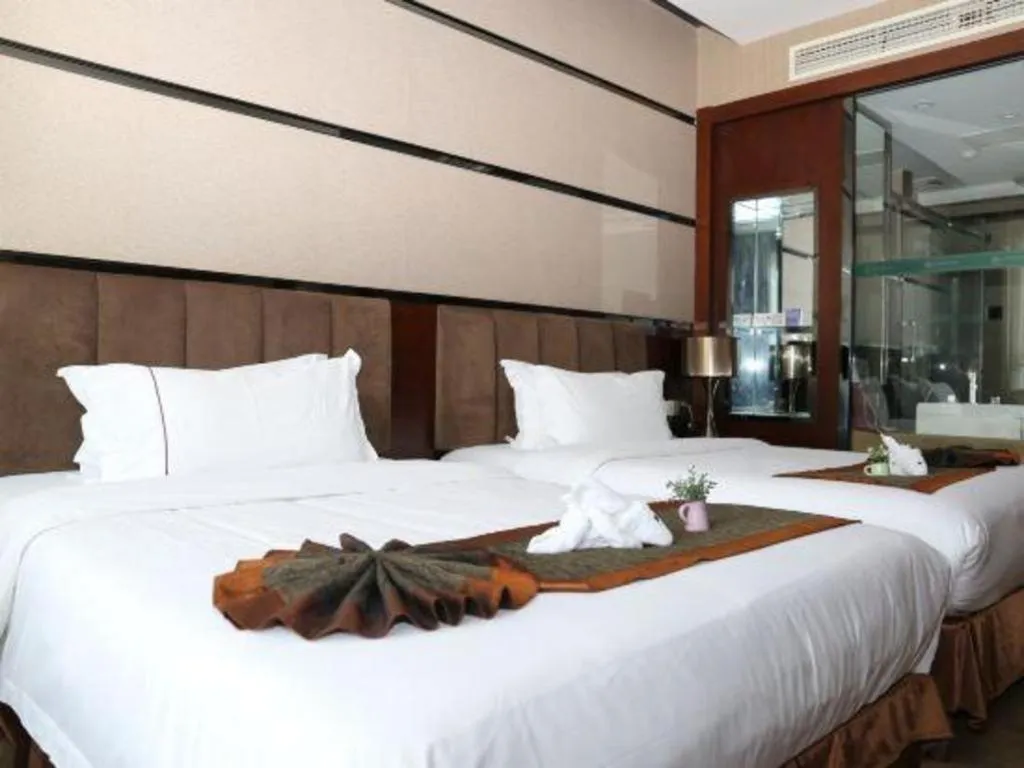 Bed in Liwan International Hotel Chengdu