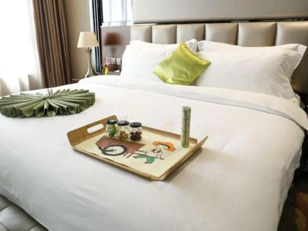 Bed in Liwan International Hotel Chengdu