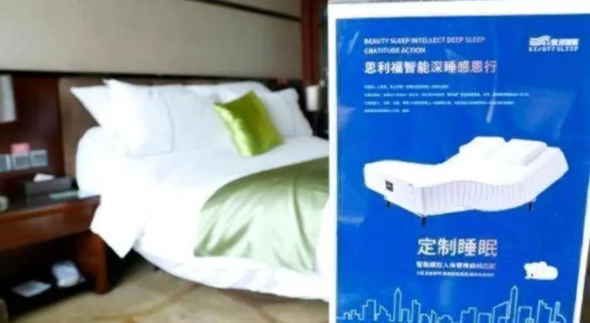 Bed in Liwan International Hotel Chengdu