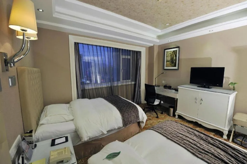 Bed in Yantai Bihai Hotel