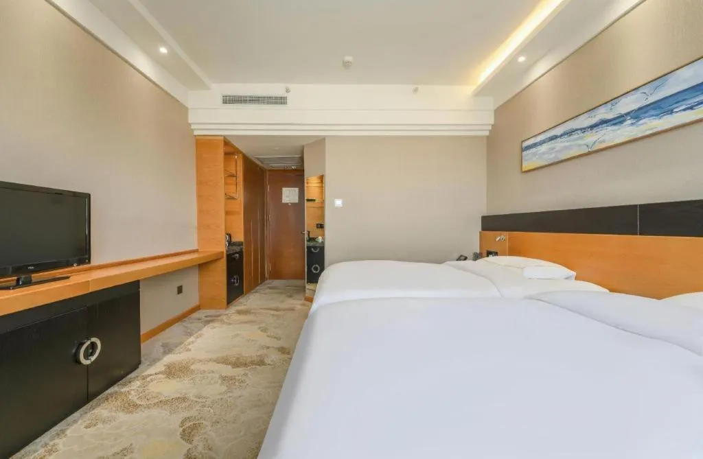 Bed in Yantai Bihai Hotel