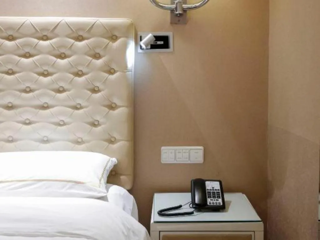 Bed in Yantai Bihai Hotel