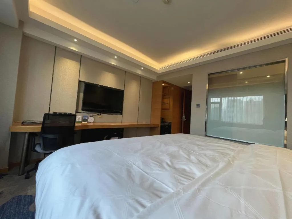 Bed in Yantai Bihai Hotel