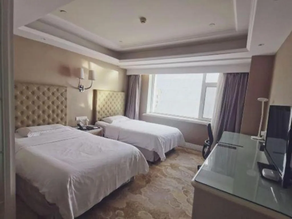Bed in Yantai Bihai Hotel