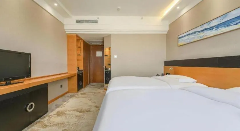 Bed in Yantai Bihai Hotel