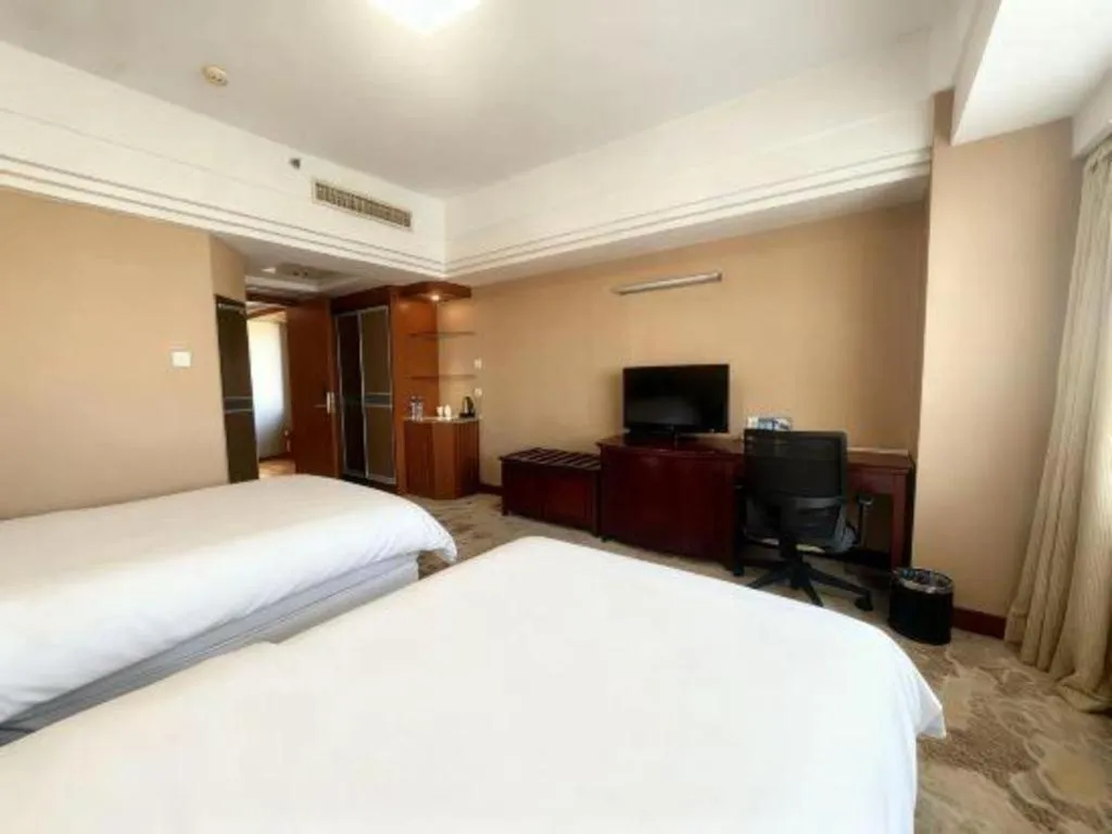 Bed in Yantai Bihai Hotel