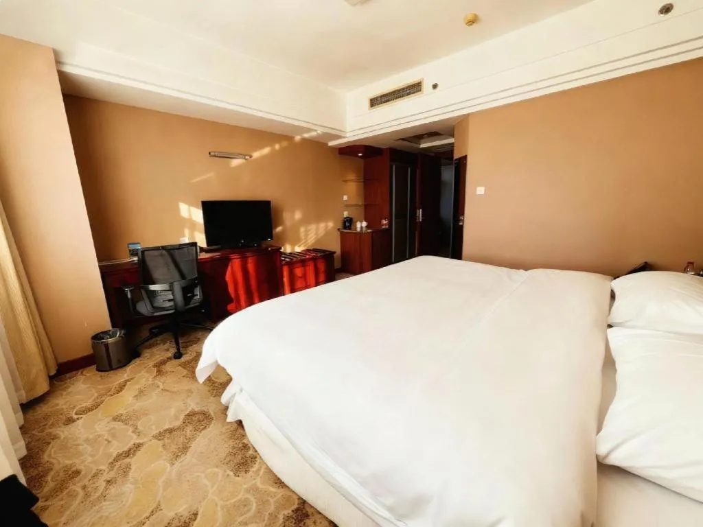 Bed in Yantai Bihai Hotel